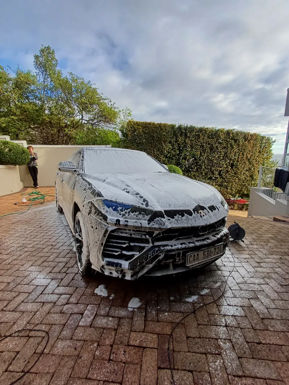Lamborghini Urus in foam during a signature detail